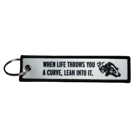 "When Life Throws You A Curve, Lean Into It" Textile Keytag